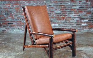 Brown wooden and leather chair