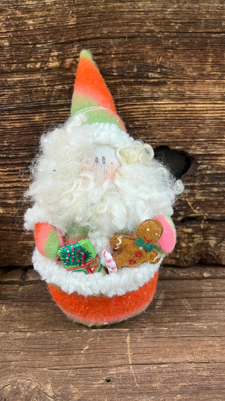 Santa w/ Pocket of Gifts H-40